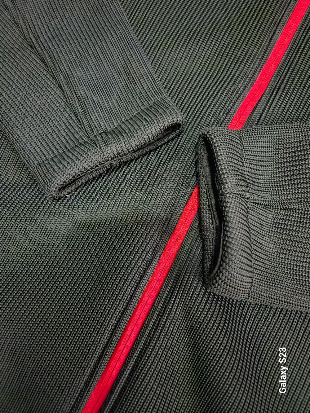 Spyder Men's Black Jacket with Red Zip and Logo